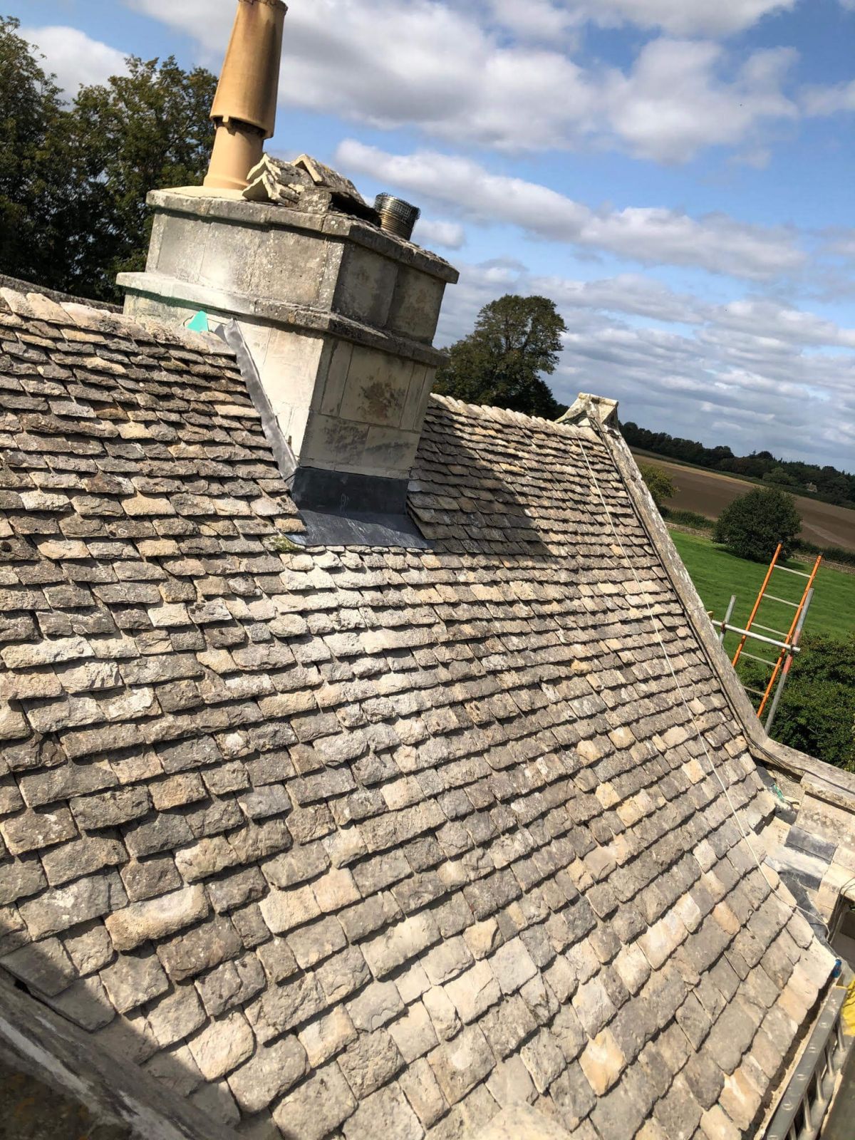Heritage Re-Roofing with Reclaimed Cotswold Stone Slate 